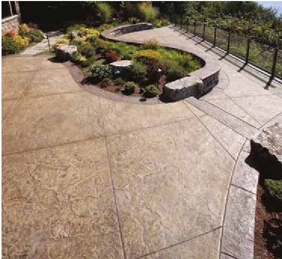Stamped concrete patio with seat wall
